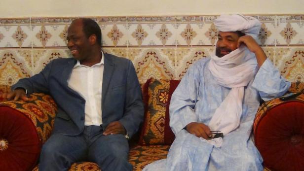 FILE PHOTO: Iyad Ag Ghaly, the alleged leader of Ansar Dine, meets the then Burkina Faso foreign minister, Djibril Bassole, in Kidal, northern Mali in 2012