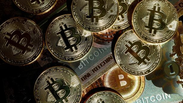 FILE PHOTO: Illustration shows representations of cryptocurrency bitcoin FILE PHOTO: Illustration shows representations of cryptocurrency bitcoin