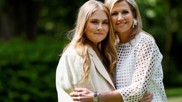 Dutch Queen Maxima and Crown Princess Amalia pose during an official photo session in The Hague