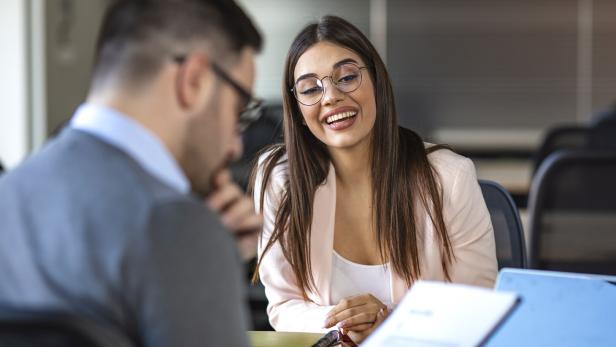 Young attractive woman during job interview Young attractive woman during job interview