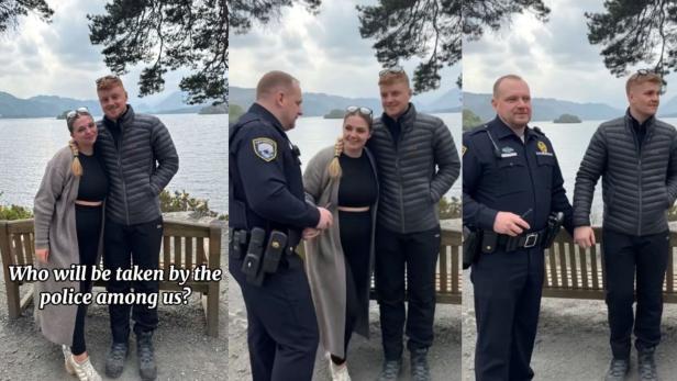 Ein Pärchen und ein Polizist vor einer See-Kulisse