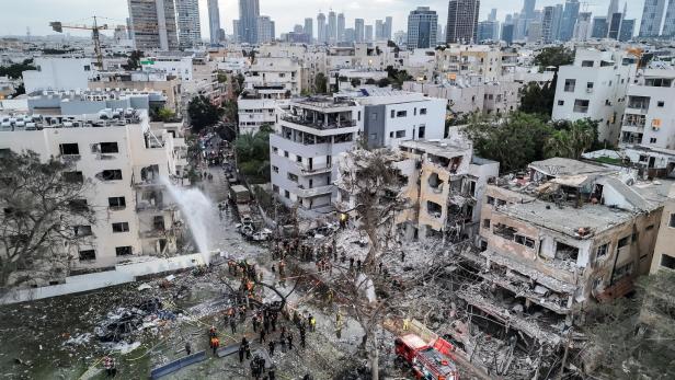 A drone photo shows the damage over residential homes at the impact site following missile attack from Iran on Israel, in Tel Aviv