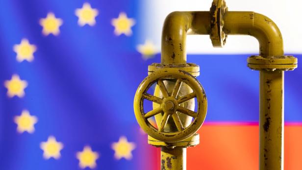 FILE PHOTO: Illustration shows natural gas pipeline in front of word EU and Russia flag colours