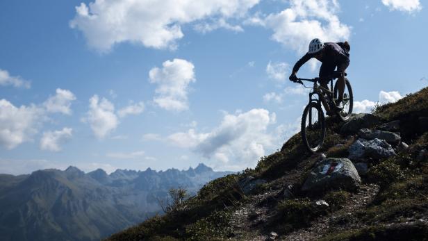 A mountainbiker rides near Flums A mountainbiker rides near Flums