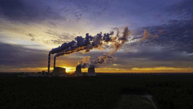 A coal-fired power station in the evening (aerial view)