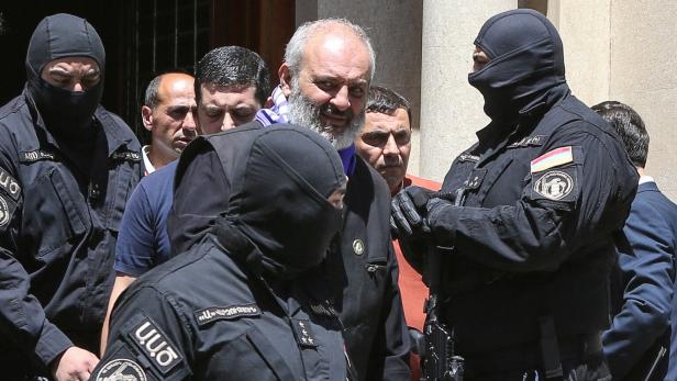 Armenia arrests archbishop over alleged coup plot