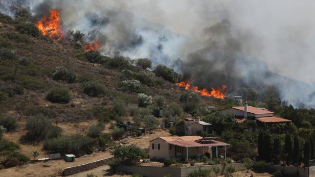 Fire burns in Palaia Fokaia, Greece's East Attica