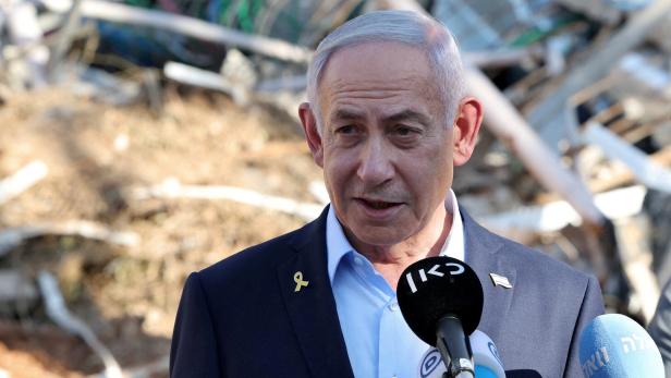 FILE PHOTO: Israel's Prime Minister Benjamin Netanyahu gives a statement during a visit to the site of the Weizmann Institute of Science, which was hit by an Iranian missile barrage, in Rehovot