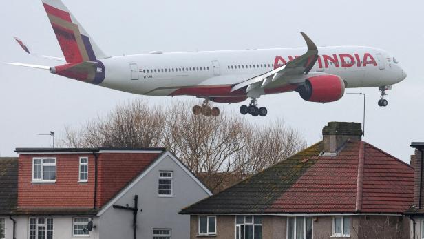 FILE PHOTO: Planes make landing approach to Heathrow Airport in west London