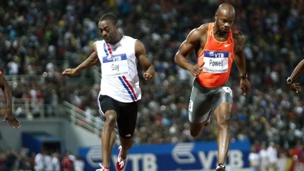 Tyson Gay of the U.S. (L) and Jamaica&#039;s Asafa Powell compete in the men&#039;s 100 meters during the IAAF World Athletics Final at Kaftazoglio stadium in Thessaloniki in this September 12, 2009 file photo. World silver medallist Gay overhauled former world record holder Powell to win the men&#039;s 100 metres at the World Athletics Final on Saturday. Over 116 years the Olympic 100 metres final has produced drama, pain, controversy, disillusionment, incredulity and unbridled joy - all crammed into a race lasting little longer than it takes to say &quot;Baron Pierre de Coubertin.&quot; REUTERS/Yorgos Karahalis (GREECE - Tags: SPORT ATHLETICS OLYMPICS)