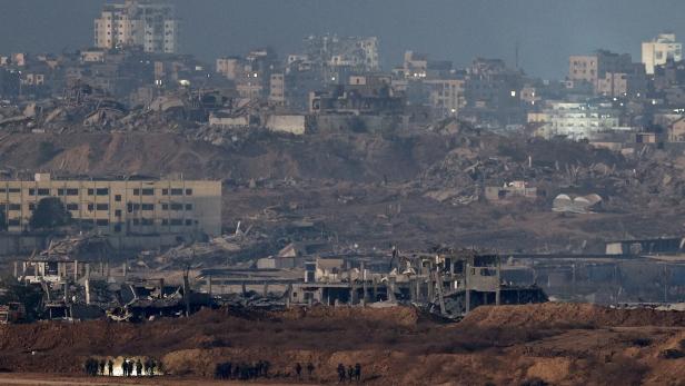 Israeli soldiers operate in Gaza, as seen from Israel Israeli soldiers operate in Gaza, as seen from Israel