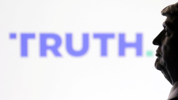 Illustration shows 3D printed miniature of U.S. president Donald Trump and Truth social logo