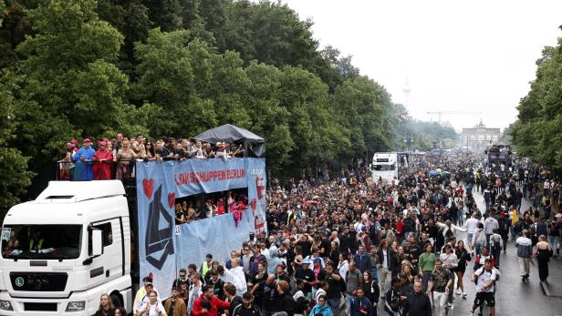 Revellers attend the 'Rave The Planet' techno parade, in Berlin Revellers attend the 'Rave The Planet' techno parade, in Berlin