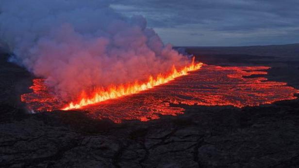 Lava emerges through a fissure following a volcano eruption near Grindavik Lava emerges through a fissure following a volcano eruption near Grindavik