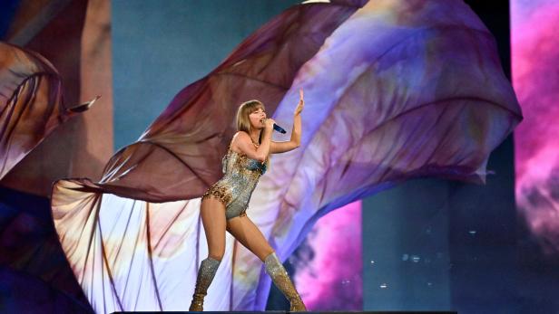 FILE PHOTO: Taylor Swift performs as her record-breaking The Eras Tour comes to an end in Vancouver