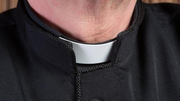 Priest clerical collar