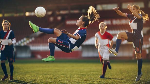 Determined bicycle kick on a soccer match!