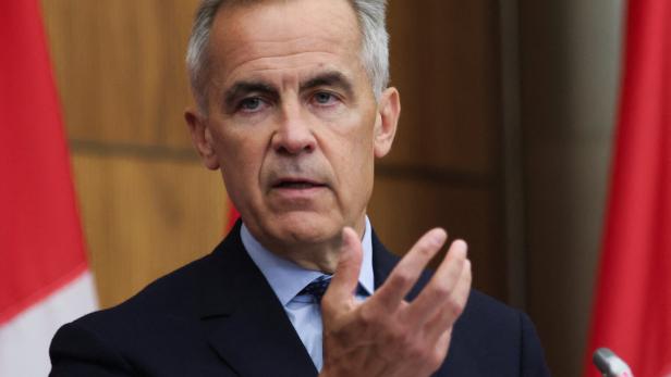 Canada's Prime Minister Mark Carney speaks at a press conference about recognizing Palestinian statehood, in Ottawa