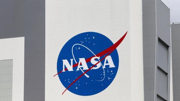 FILE PHOTO: Astronauts arrive before launch to the International Space Station, in Cape Canaveral