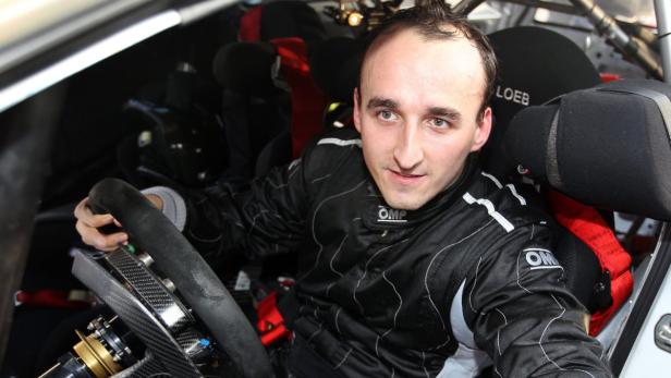 epa03483626 Polish Formula One driver Robert Kubica is seen in his Citroen C4 WRC during Var&#039;s Rally in Sainte Maxime, southern France, 23 November 2012. Robert Kubica&#039;s Formula One racing career was interrupted by a near-fatal rally crash on 06 February 2011 at the Ronde di Andora rally, but he hopes to return to the track soon although his arm is still not ready for single-seaters. EPA/SEBASTIEN NOGIER