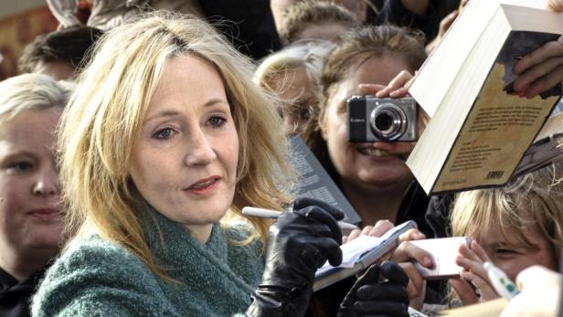 British author J.K. Rowling signs autographs outside Odense Concert Hall in Odense October 19, 2010. Rowling is in Denmark to receive the Hans Christian Andersen Literature Award 2010. The Danish fairy story teller Hans Christian Andersen(1805-1875) was born in Odense. REUTERS/Jens Norgaard Larsen/SCANPIX (DENMARK - Tags: ENTERTAINMENT MEDIA) NO THIRD PARTY SALES. NOT FOR USE BY REUTERS THIRD PARTY DISTRIBUTORS. DENMARK OUT. NO COMMERCIAL OR EDITORIAL SALES IN DENMARK