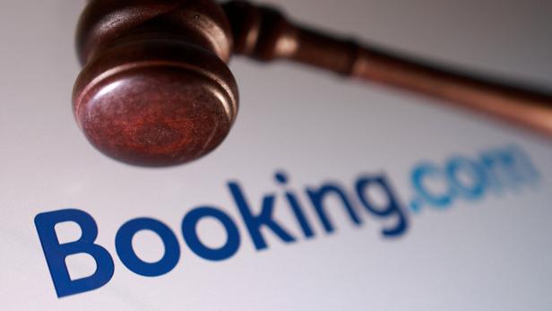 Illustration shows Booking.com logo and court gavel