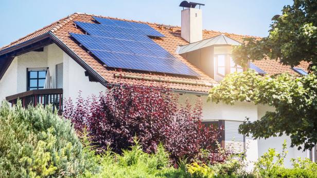 Old House with Solar Panels Station