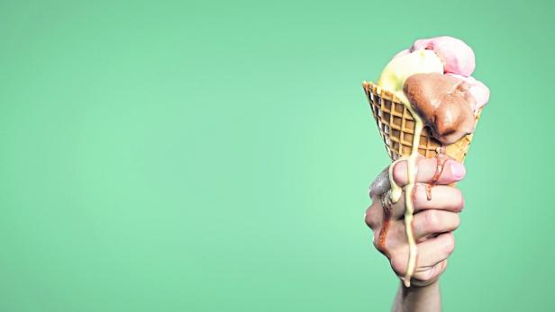 Ice cream melting in the hand panorama Ice cream melting in the hand panorama