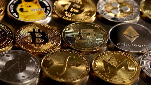 FILE PHOTO: FILE PHOTO: FILE PHOTO: Illustration shows representations of cryptocurrencies