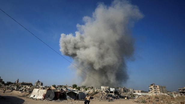Smoke rises following an Israeli strike, in Gaza City