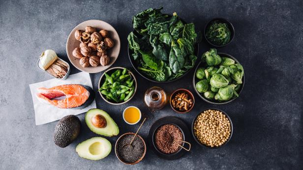 Omega 3 rich food items on slate background Omega 3 rich food items on slate background