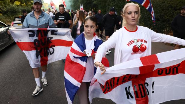 Protesters attend an anti-immigration demonstration, in Epping Protesters attend an anti-immigration demonstration, in Epping