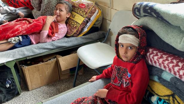 Palestinians wounded in Israeli strikes shelter in a school where they experience food shortages, near Rafah Palestinians wounded in Israeli strikes shelter in a school where they experience food shortages, near Rafah
