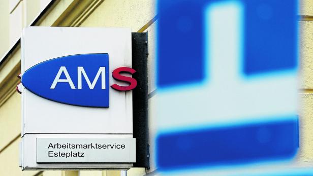 The logo of AMS jobcentre is seen behind traffic signs in Vienna The logo of AMS jobcentre is seen behind traffic signs in Vienna