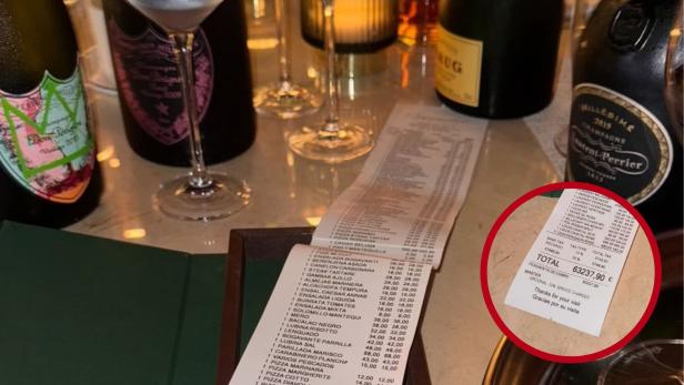 Rechnung Mehrere Flaschen Champagner und eine lange Rechnung auf einem Tisch