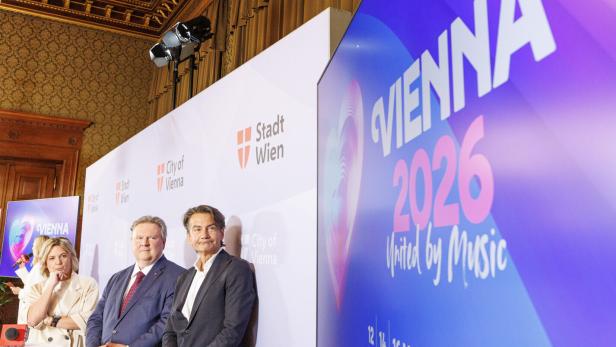 Bürgermeister Ludwig mit ORF-Chef Weißmann vor einem Song-Contest-Plakat.