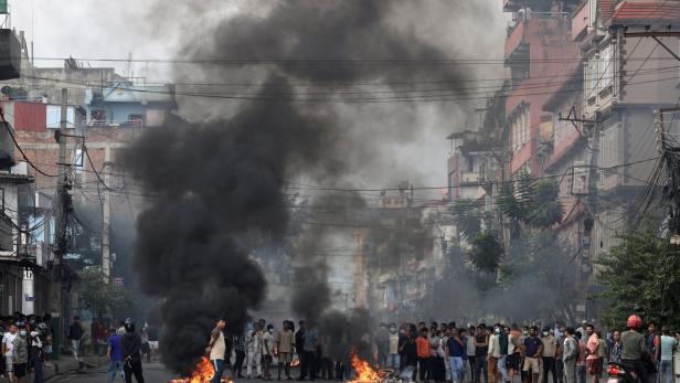 Demonstrators gather to protest against Monday's killing of 19 people, in Kathmandu