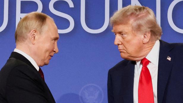 FILE PHOTO: U.S. President Trump meets with Russian President Putin in Alaska