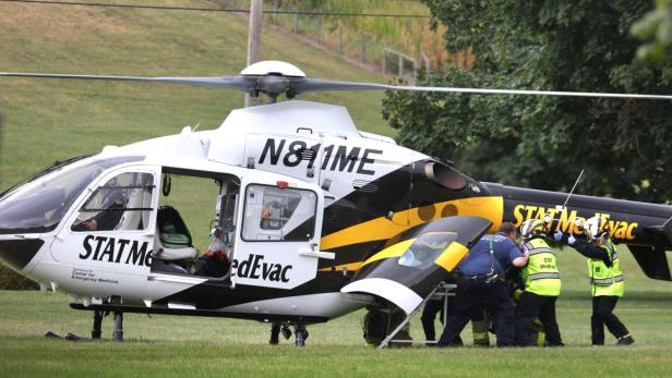 A police officer is loaded into a Medevac helicopter after a shooting incident in York County's North Codorus Township