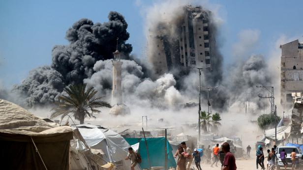 Israeli strike hits the 15-story Mushtaha Tower in Gaza City Israeli strike hits the 15-story Mushtaha Tower in Gaza City