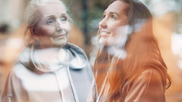 Grandmother and granddaughter women double exposure image. Young and elderly woman portrait. Love and happy family relations concept.