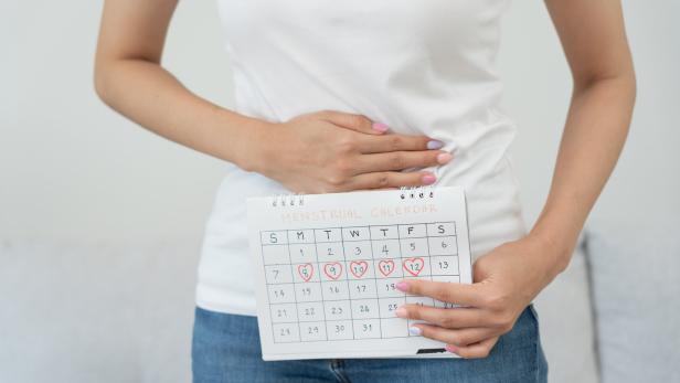 stomach ache. Asian women have abdominal pain, indigestion, gastritis, menstrual cramps, flatulence, diarrhea, distention, colon cancer, belly inflammation problem, suffer food poisoning, abdomen