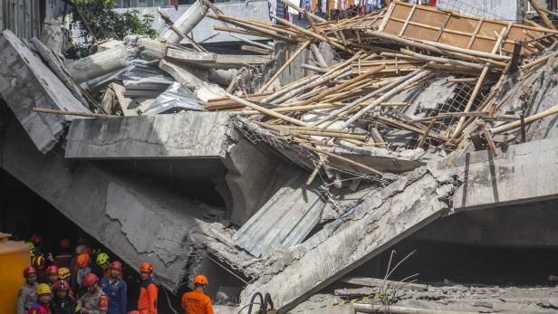 Rescue operation for students feared trapped under a collapsed building at Islamic boarding school in East Java