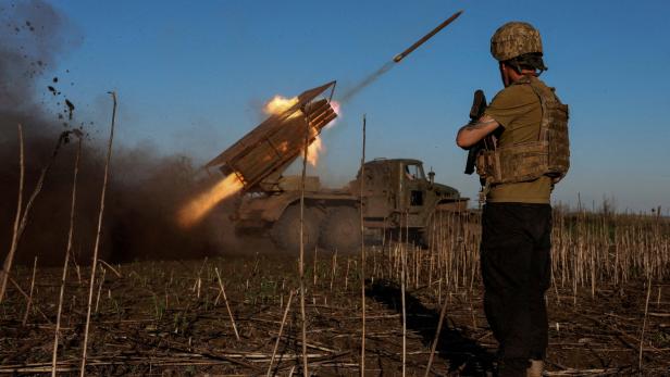 FILE PHOTO: Ukrainian servicemen fire a Grad MLRS towards Russian troops near the frontline town of Pokrovsk