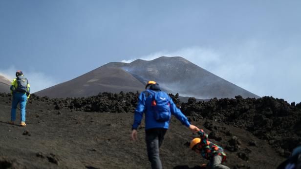 Tourism on Mount Etna during eruption