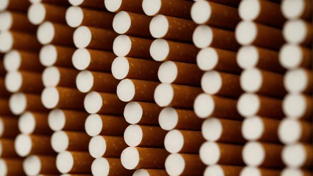 FILE PHOTO: Cigarettes are seen during manufacturing process in BAT Cigarette Factory in Bayreuth FILE PHOTO: Cigarettes are seen during manufacturing process in BAT Cigarette Factory in Bayreuth