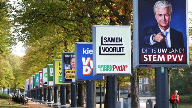 Election campaign boards are displayed ahead of the Dutch parliamentary election on October 29, in The Hague