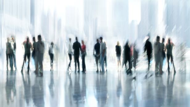 Bildnummer: 35826398 abstract image of a people standing in the office lobby in intentional motion blur and a blue tint