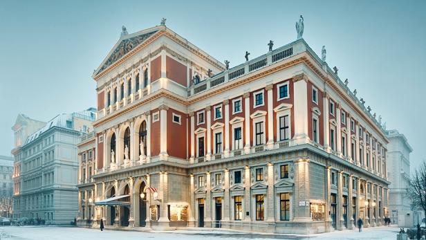 Historisches Gebäude mit klassizistischer Fassade und Statuen auf dem Dach bei winterlichem Wetter mit Schnee auf dem Boden.