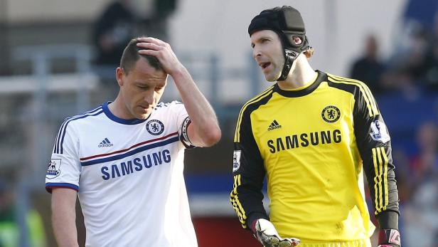 Chelsea's Terry and Cech react after their English